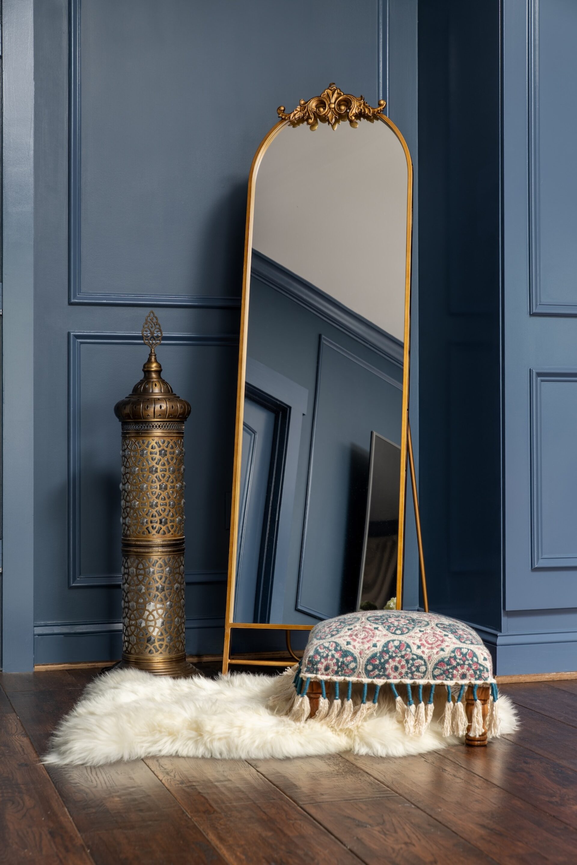 Gold Framed Mirror And Faux Fur Rug