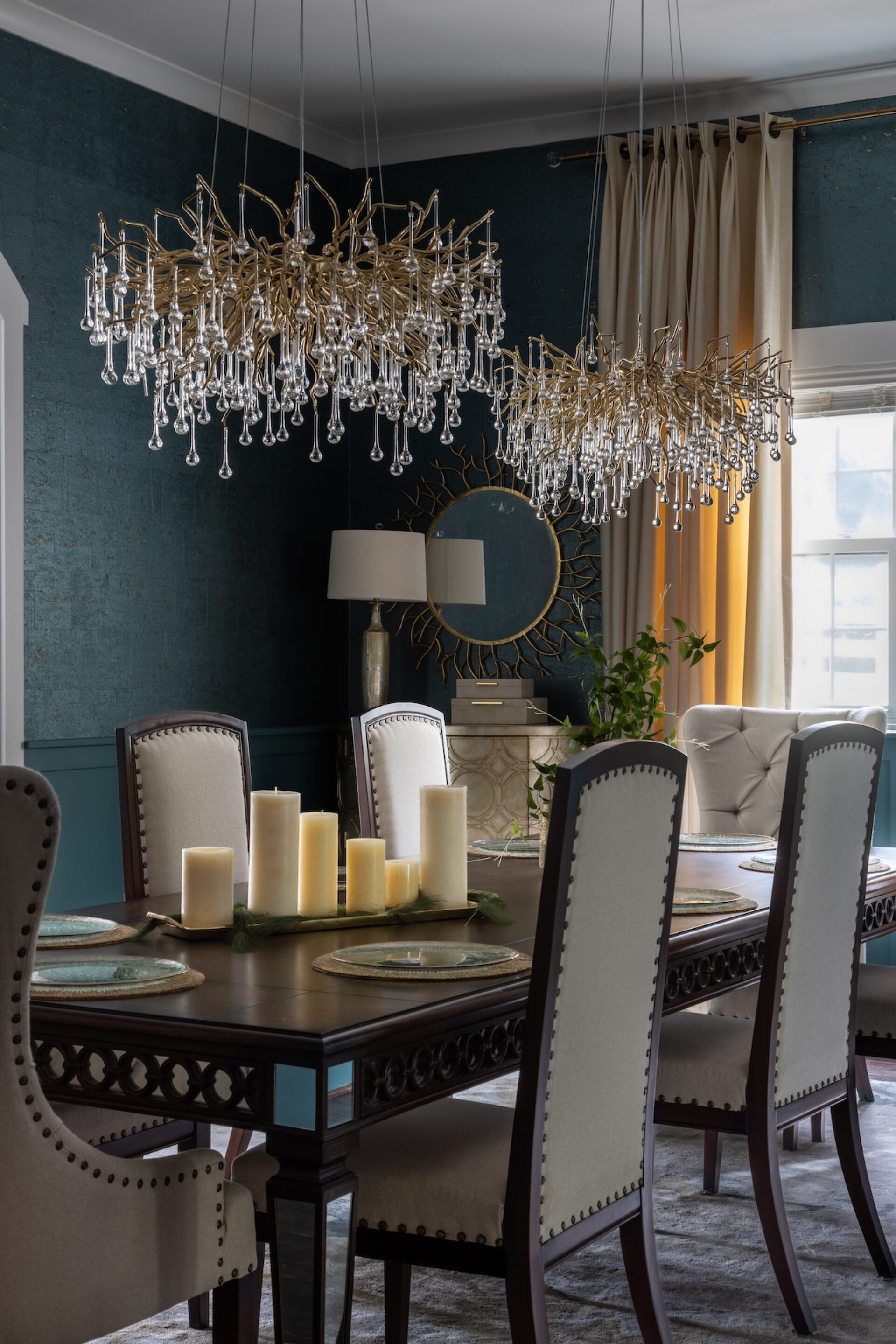 twin chandeliers in dining room